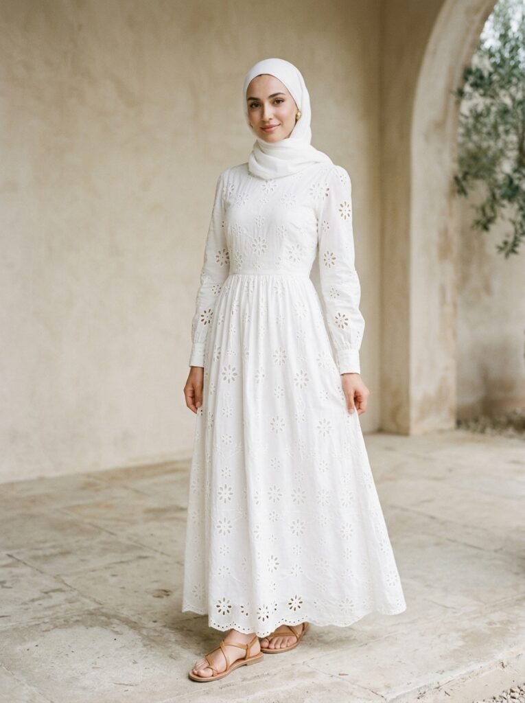 Woman in white dress hijab 202607071339
